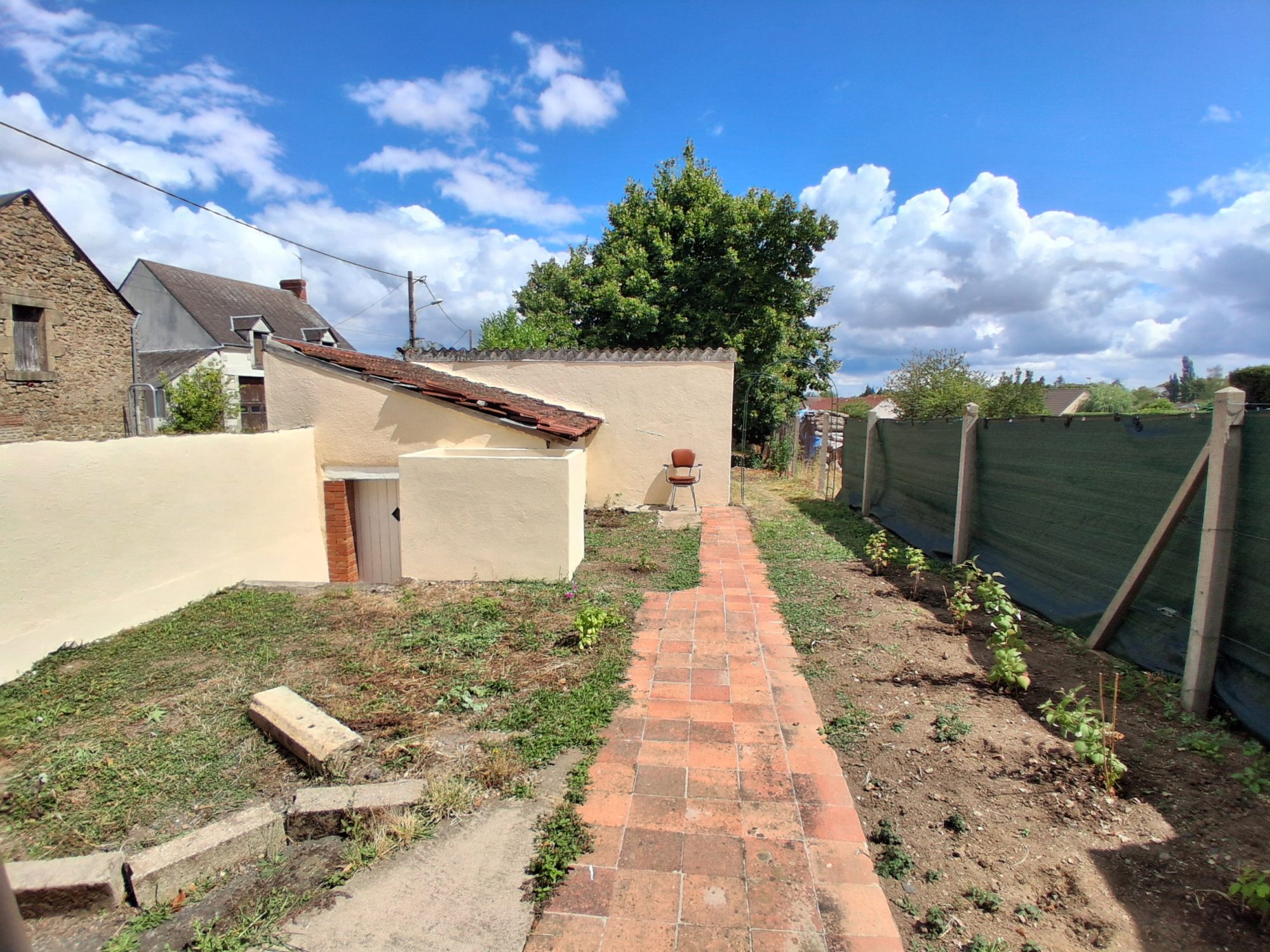 Photo 2 - Maison de ville avec jardin et garage !
