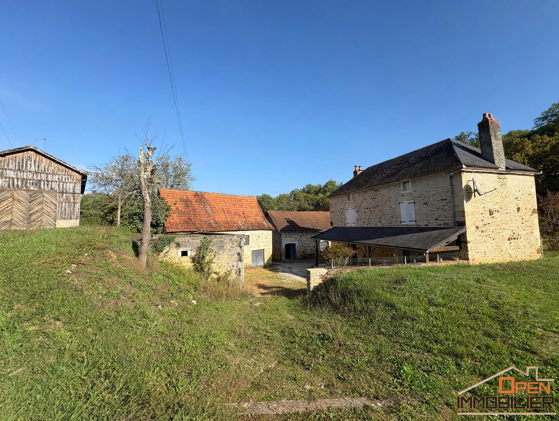 Photo 2 - Corps de ferme-3 séchoirs à tabac-2 granges-terrain 2 hectares